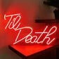 Neon sign with the text 'Til Death' on a red background.